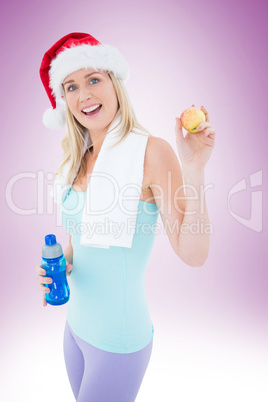 Festive fit blonde smiling at camera