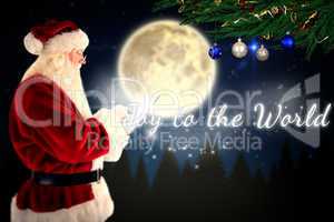 Composite image of santa uses a tablet pc