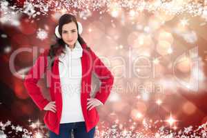 Composite image of smiling brunette posing with winter wear