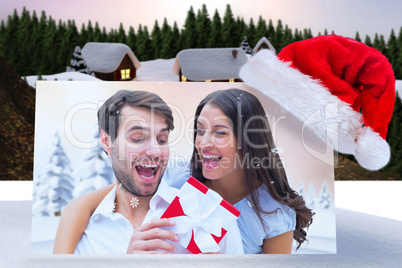 Composite image of woman surprising boyfriend with gift