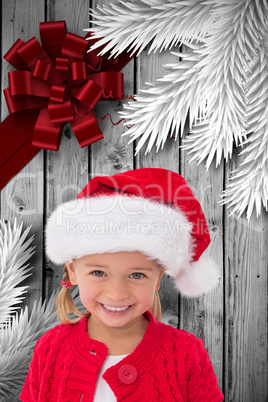 Composite image of cute little girl wearing santa hat Composite image of cute little girl wearing santa hat