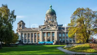 hamburg courthouse by day with blue sky and city park - DSLR hyperlapse / tracking shot / timelapse