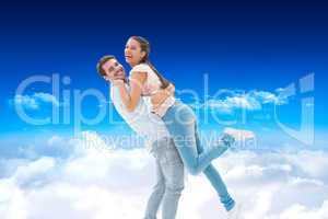 Composite image of attractive young couple hugging each other