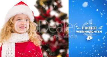 Composite image of festive little girl in santa hat and scarf