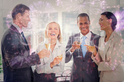 Composite image of business team celebrating with champagne