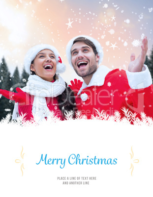 Composite image of festive young couple