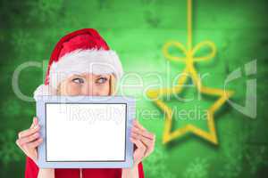 Composite image of woman holding a tablet