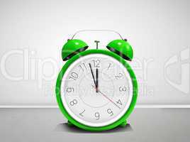 Composite image of alarm clock counting down to twelve