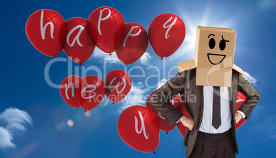 Composite image of anonymous businessman with hands on hips