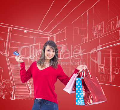 Composite image of brunette holding gift and credit card