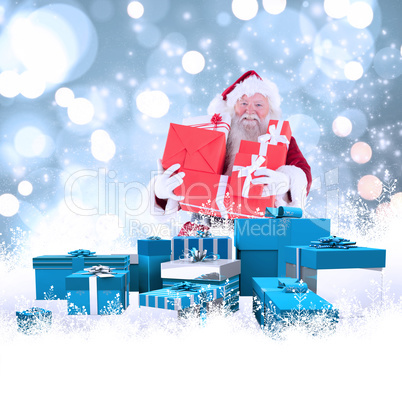 Composite image of santa carries a few presents