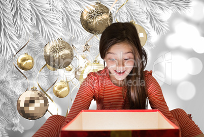 Composite image of little girl getting gift