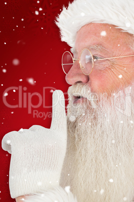 Composite image of santa claus making quiet sign