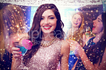 Composite image of brunette with cocktail