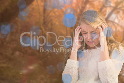 Composite image of pretty blonde getting a headache on the couch