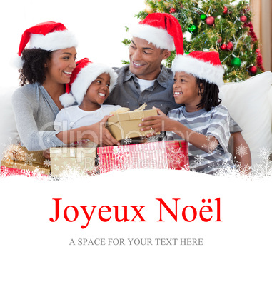 Composite image of family celebrating christmas at home