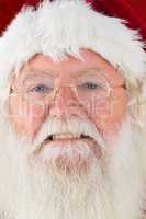 Composite image of santa smiles in the camera