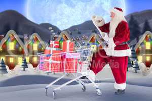 Composite image of santa delivering gifts from cart