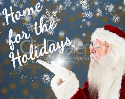 Composite image of santa claus blowing Composite image of santa claus blowing