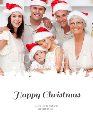 Composite image of smiling family baking christmas cakes