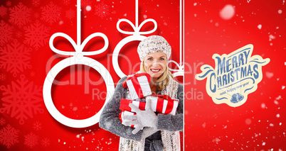 Composite image of happy blonde with gifts