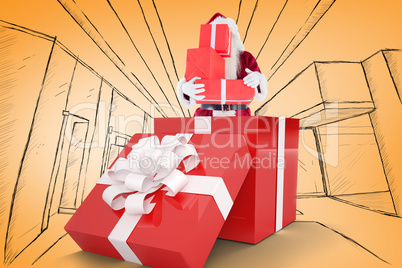 Composite image of santa standing in large gift