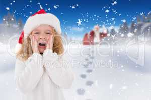 Composite image of festive little girl with hands on face