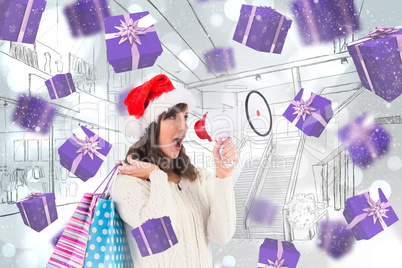 Composite image of festive brunette holding megaphone and bags