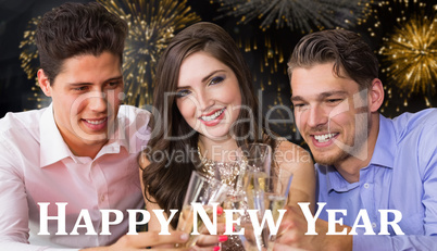 Composite image of friends toasting with champagne