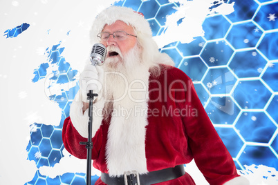 Composite image of santa claus is singing christmas songs