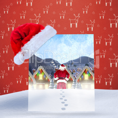 Composite image of santa delivery presents to village