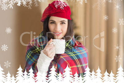 Composite image of brunette with cover holding mug