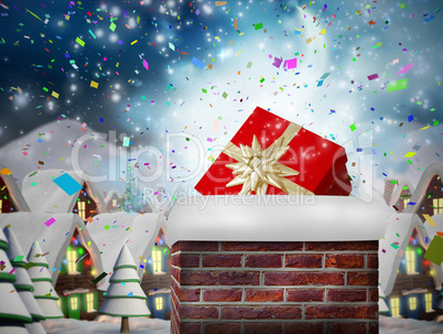 Composite image of chimney filled with gift