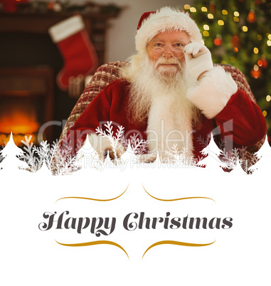 Composite image of smiling santa holding his glasses