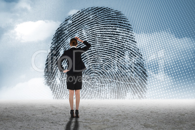 Composite image of young businesswoman standing and thinking