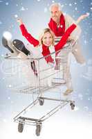 Happy festive couple messing in trolley