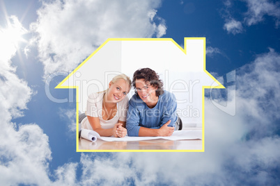 Composite image of cute couple moving in a new house