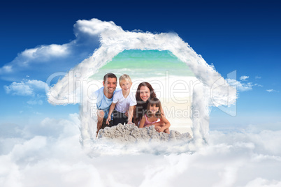 Composite image of radiant family at the beach