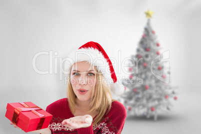 Composite image of woman blowing a kiss