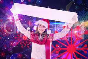 Composite image of festive woman presenting empty banner