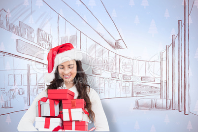 Composite image of festive brunette holding pile of gifts