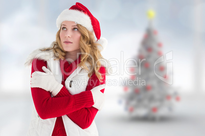 Composite image of portrait of woman in warm clothing