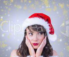 Composite image of pretty santa girl with hands on face