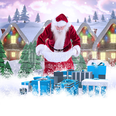 Composite image of santa looks in his bag