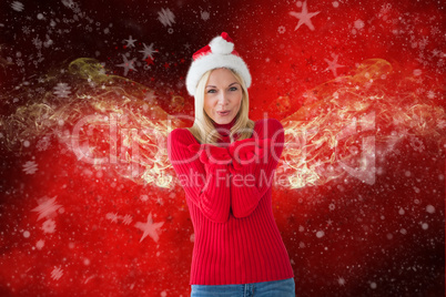 Composite image of happy festive blonde