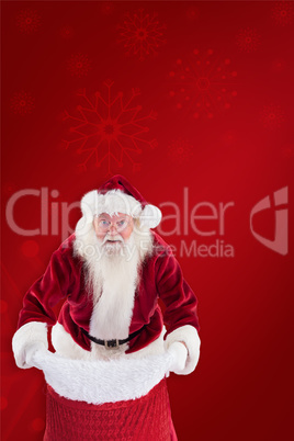 Composite image of santa open his red bag