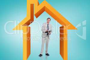 Composite image of businessman writing on clipboard