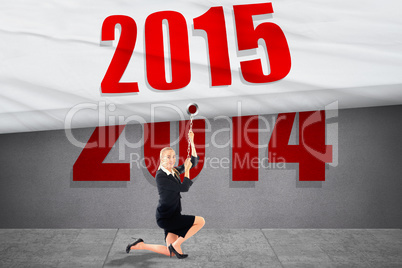 Composite image of businesswoman pulling a chain