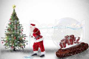 Composite image of santa pulling snow globe of presents