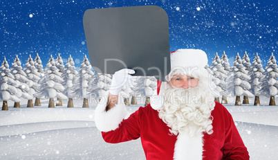 Composite image of happy santa claus holding speech bubble